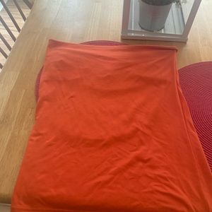 Love this top! Strapless bright orange.